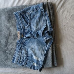 Distressed denim shorts